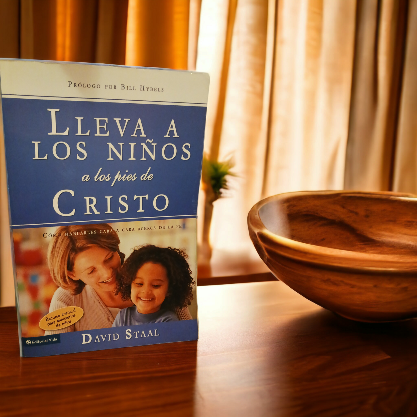 Lleva a los niños a los pies de Cristo